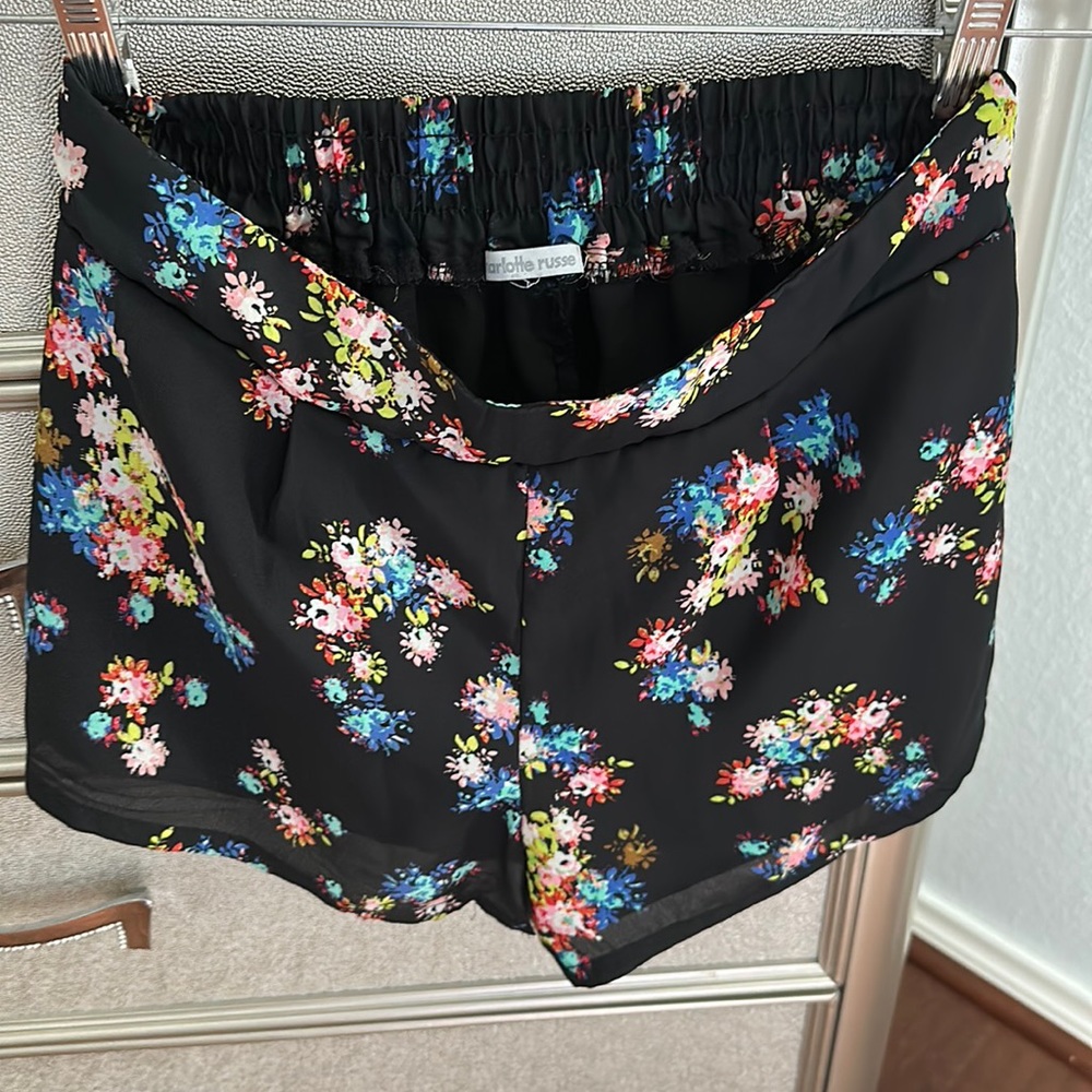 Size small black floral print shorts